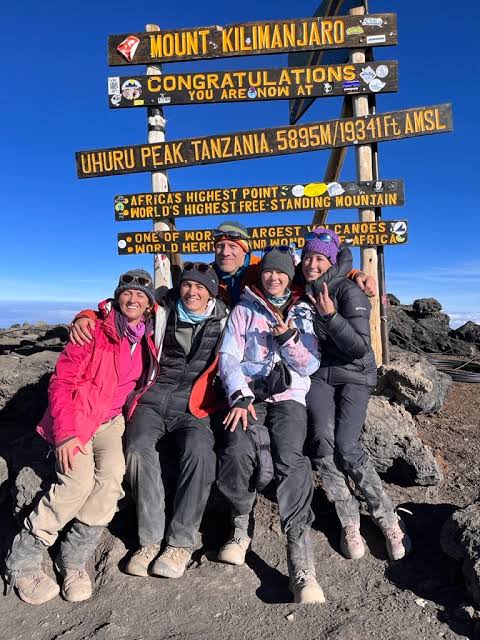 Professional Kilimanjaro climbing guide leading a trek on the Lemosho Route