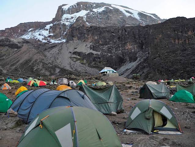 Stunning view of Barranco Camp nestled beneath the breach wall on the Mount Kilimanjaro Umbwe Route