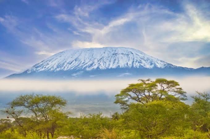 Breathtaking view of the snow-capped African summit from the Barranco Valley path