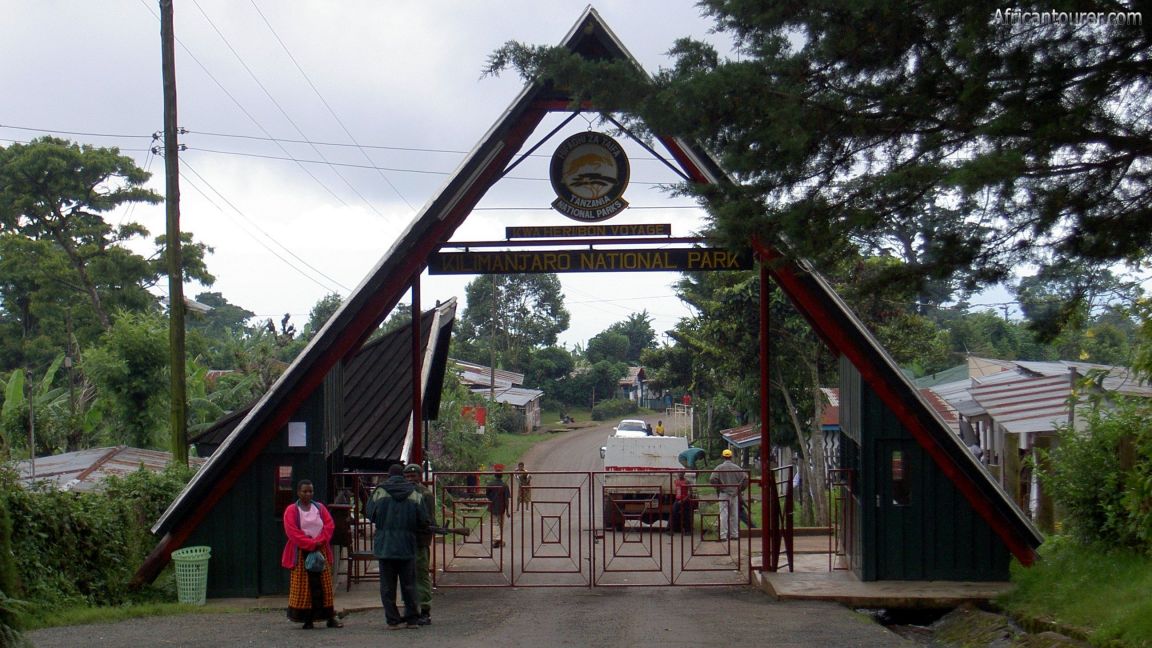 Successful trekkers checking out at Marangu Gate after completing their Mount Kilimanjaro climbing tour