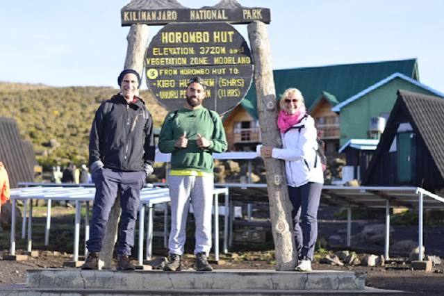 Trekkers registering at Nalemuru Gate for the scenic Mount Kilimanjaro Rongai route climbing tour