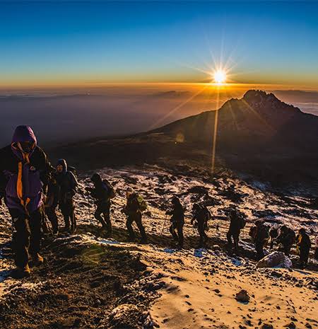 Discerning travelers traversing the scenic trails on the luxury 8-Day Northern Circuit Route