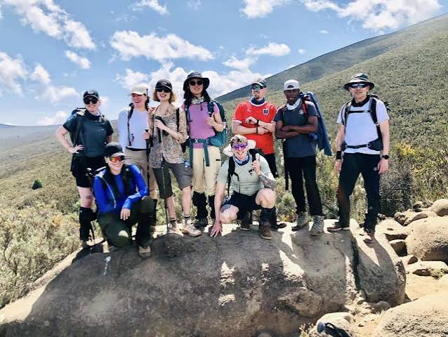 Trekkers ascending the peaceful northern slope on the 6-Day Rongai Route