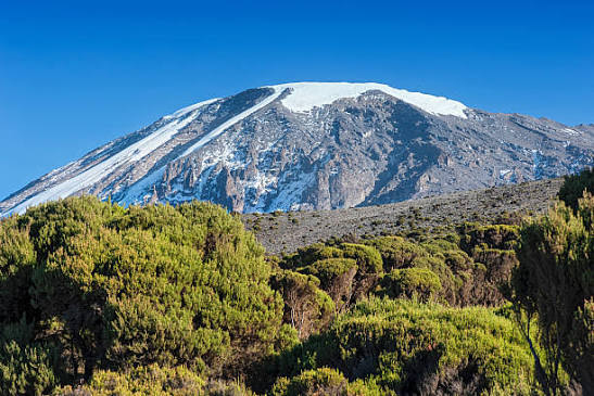 Luxury walk-in camping setup at the Third Cave campsite on Mount Kilimanjaro northern slopes